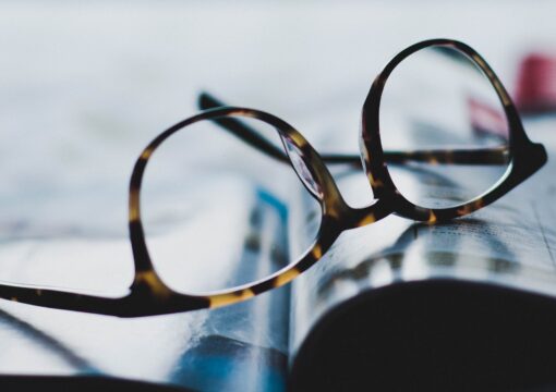 Reading glasses on a book