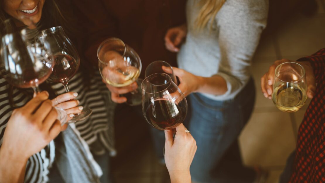 A group of people toasting each other