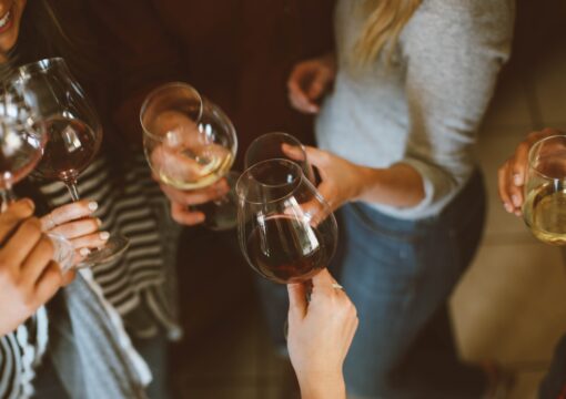 A group of people toasting each other