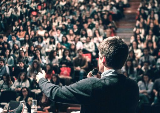 A man addressing a crowd