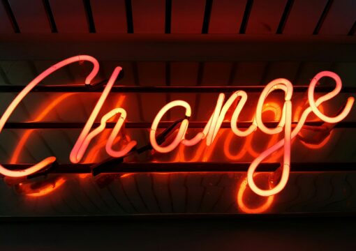 Neon sign reading 'change'
